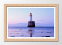 Cuadro enmarcado natural paisaje faro sobre el mar, atardecer,tonos morados